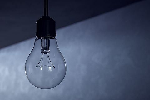 Electrical blackout. Unlit bulb shows a general blackout.